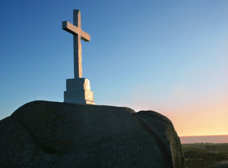White cross on a rockの写真素材