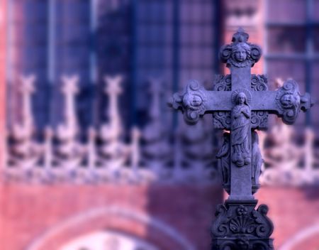 Details of a stone cross with religious figuresの写真素材