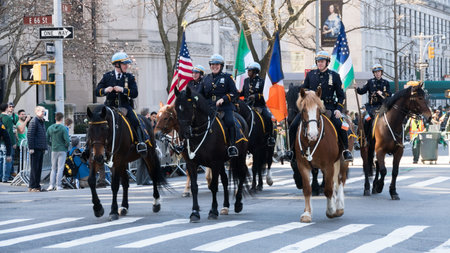 NEW YORK, NY, USA - MARCH 16 2016:  Marchers on horseback at the St. Patrick's Day Parade
