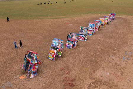 Abandoned vehicles painted with bright graffitiのeditorial素材