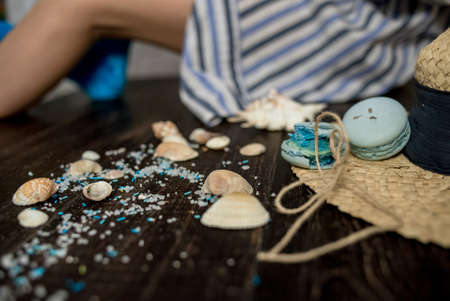 Sea style decoration of macaroons in concept of dreaming about sea travelの写真素材
