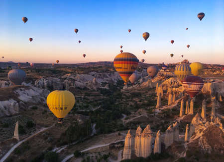 Famous hotair balloons at Kapadokya are making  everyone to dream about visiting Turkey and this beautiful and romantic regionのeditorial素材
