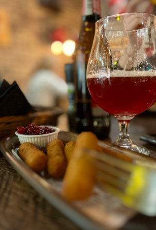 Wine and snacks on a table in a restaurant. Selective focus.の写真素材