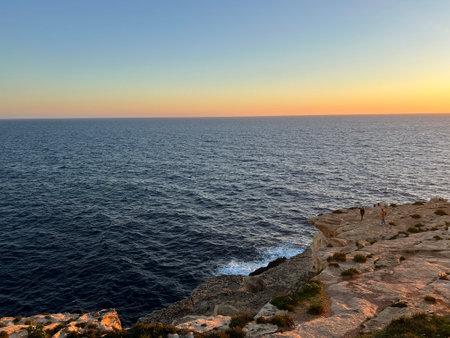 Blue Grotto is a complex of seven caves found along the southern coast of Malta. Wied iz-Zurrieq harbor and Blue Grotto sea caves are located on the coastline opposite to Filflaの写真素材