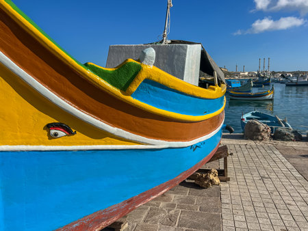 Fishing boats in the harbor of Marsaxlokk, Malta in a beautiful sunny dayの写真素材