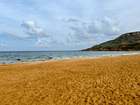 Beautiful sandy beach on the Coast of the island of Gozo, Malta. The Mediterranean Sea.の写真素材