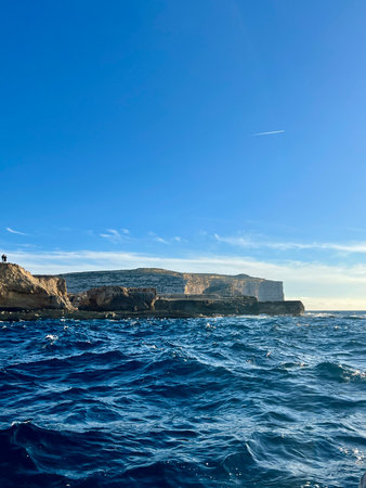Beautiful view of the cliffs of the island of Gozo, Malta. Blue water of the Mediterranean Sea.の写真素材