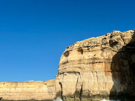 Rocky coast at Xlendi Bay of the island of Gozo, Malta, Europeの写真素材