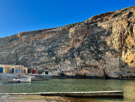 Fishing boats on the coast of Xlendi Bay, the island of Gozo, Malta.の写真素材