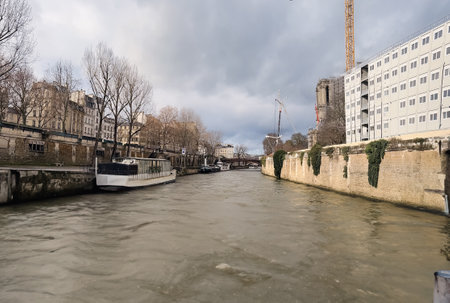 River Seine in Paris, France, under a cloudy sky.の写真素材