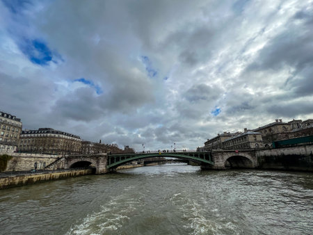 River Seine and Pont de Bir-Hakeim in Paris, France on a cloudy winter dayの写真素材