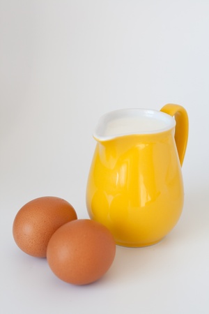 Pitcher of milk, eggs and flourの写真素材