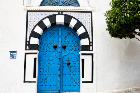 Blue doors and white wall of building in Sidi Bou Said, Tunisiaのeditorial素材
