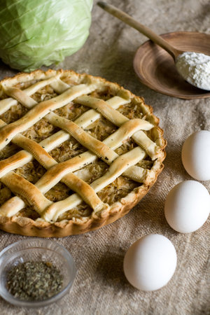 Traditional rustic vegetarian pie with cabbage and onionsの写真素材