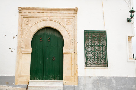 Locked Wooden Front Door of the Old House in Mahdia, Tunisiaのeditorial素材