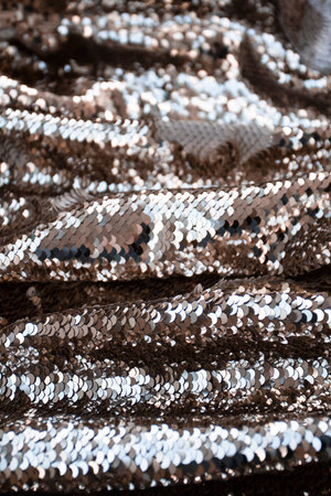 Beige festive shiny background with place for festive inscriptionの写真素材