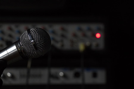 Microphone in studio on a background of the equipmentの写真素材