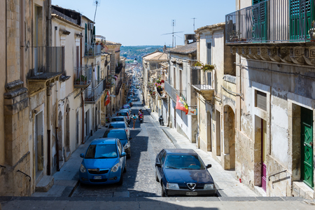 NOTO, ITALY - AUGUST 19 2017:  The particular streets of Noto in Sicily are narrow and blocked over time.Sicilyのeditorial素材