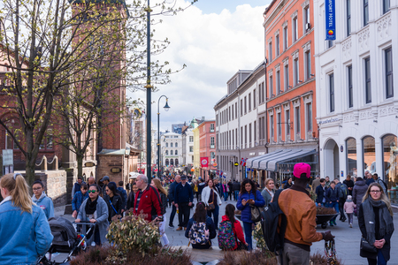 OSLO, NORWAY 28 APRIL 2018:  Tourists and residents stroll in the central area of Oslo, Norwayのeditorial素材