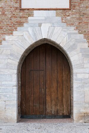 Old wooden door  ,italyの写真素材