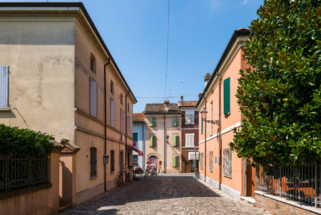 CESENATICO - 7 AUGUST 2018: A picturesque narrow street in Cesenatico on a summer day, Emilia...