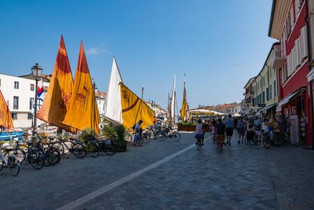 CESENATICO - AUGUST 7, 2018: Tourists walking  in the Porto Canale Leonardesco of Cesenatico, Emilia Romagna, Italyのeditorial素材