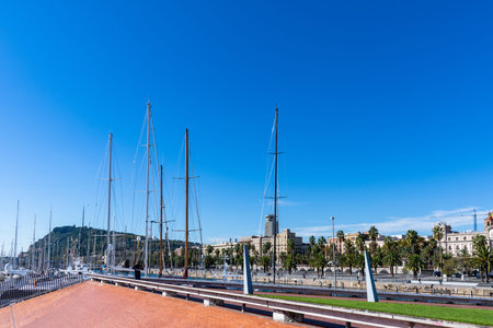 Masts of sailboats in the harbour of Barcelona. Spain.
