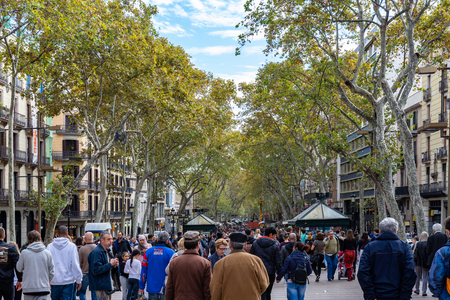 Barcelona, Spain - November 02, 2018: La Rambla, crowded main street in Barcelona. Spain.のeditorial素材