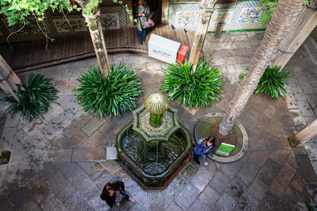 Barcelona, Spain - November 02, 2018: Casa de l'Ardiaca, courtyard shaded by trees and cooled by fountains. Barri Gotic, Barcelona. Spain.のeditorial素材