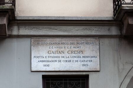 Milan, Italy - April 25 2013: The only commemorative plaque in the Milanese dialect dedicated to the poet Gaetano Crespi located in Via Santa maria Podone 3 in Milanのeditorial素材