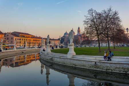 PADOVA, ITALY - December 28, 2016 - Statues at the largest square in the city of Padova known as Prato della Valle are reflected on the water of the canalのeditorial素材
