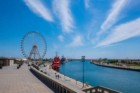 Valencia, Spain: June 14, 2015 - Panoramic view of the port of Valencia with the Ferris wheel in the backgroundのeditorial素材