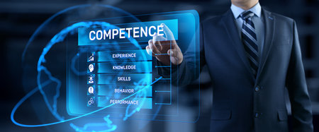 Competence skills business and personal development concept. Businessman pressing button on screen.の写真素材
