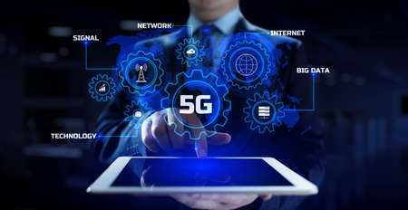 5G High-speed internet connection concept. Businessman pressing button on screen.の写真素材