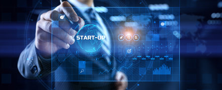 Startup new business idea. Businessman pressing button on screen