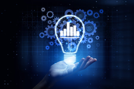 Analysis Enhancing Decision-Making and Insights with Human Hand Holding Lamp Hologram.の写真素材