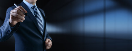 Businessman pressing button on virtual screen, Digital Touch Interaction on Futuristic Technology Interface.の写真素材