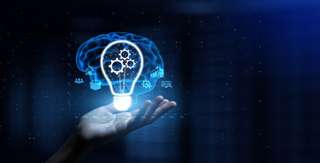 Gears as Automation Concept Enhancing Efficiency and Workflow with Human Hand Holding Lamp Hologram.