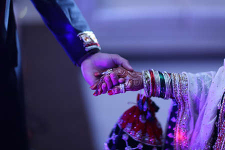 A perfect pick for brides who donât wish to opt for the usual diagonal  traditional foot henna designs.の写真素材