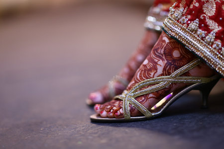 A perfect pick for brides who donât wish to opt for the usual diagonal  traditional foot henna designs.の写真素材