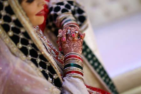 A perfect pick for brides who donât wish to opt for the usual diagonal  traditional foot henna designs.の写真素材