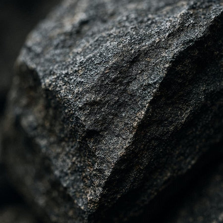 Close up of black stone background. Macro photo of natural stone.