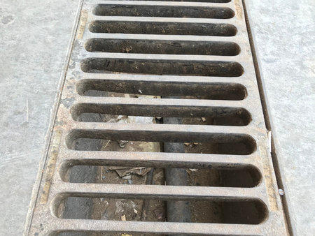 Channel gratings made of ductile iron material for drainage purpose at an car cleaning location so...