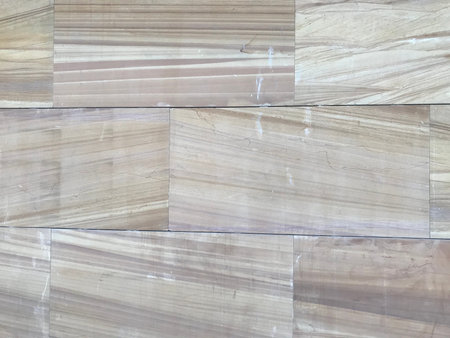 Wall tiles designed like laminate wood grains pattern for an exterior finishes of an commercial...