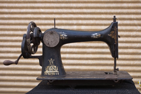 the sewing machine old on a table