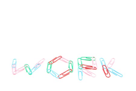 Many paperclips on the white backgroundの写真素材