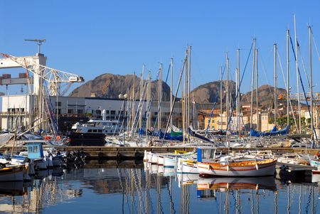 Port of La Ciotat in France with buildings in the backgroundの写真素材