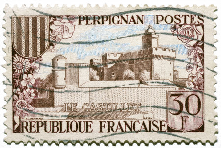 French postage stamp with castle Le Castillet of Perpignan, french commune in the Pyrénées-Orientales department, Langedoc-Roussillon region, Europeのeditorial素材