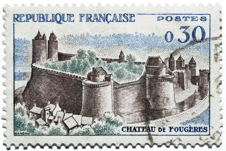 French postage stamp with castle of Fougères, french commune in the Ille-et-Vilaine department, Brittany region, Europeのeditorial素材