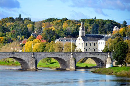 Old bridge of Wilson on the river Loire and church at Tours, city in central France, the capital of...